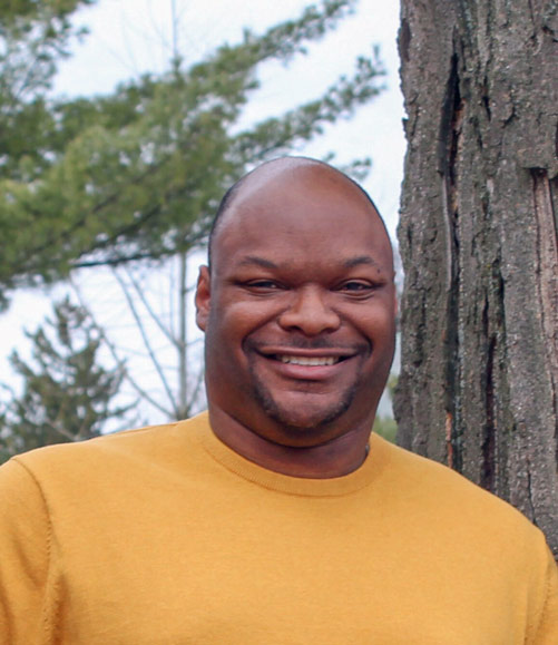 A photo of Kas Anderson Jr. outside.