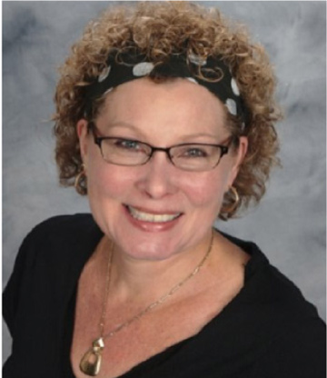 Dr. Robin Lin Miller smiles at the camera for a professional headshot.