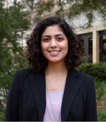 A headshot of Alexandra Vazquez outside.