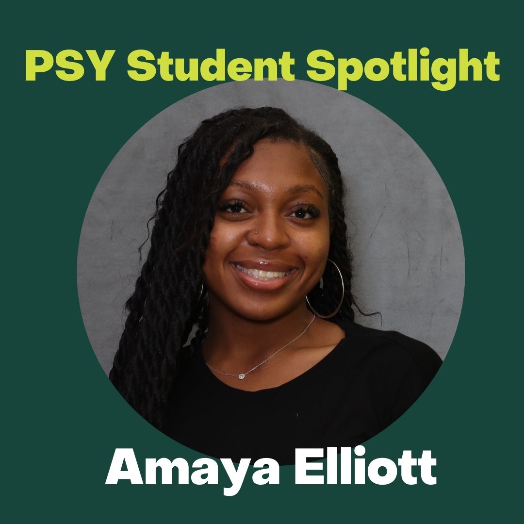 A circular photo of Amaya Elliott smiling directly at the camera. She wars a black shirt, a necklace, and hoop earrings. Around the circle is a green background that says "PSY Student Spotlight Amaya Elliott." 