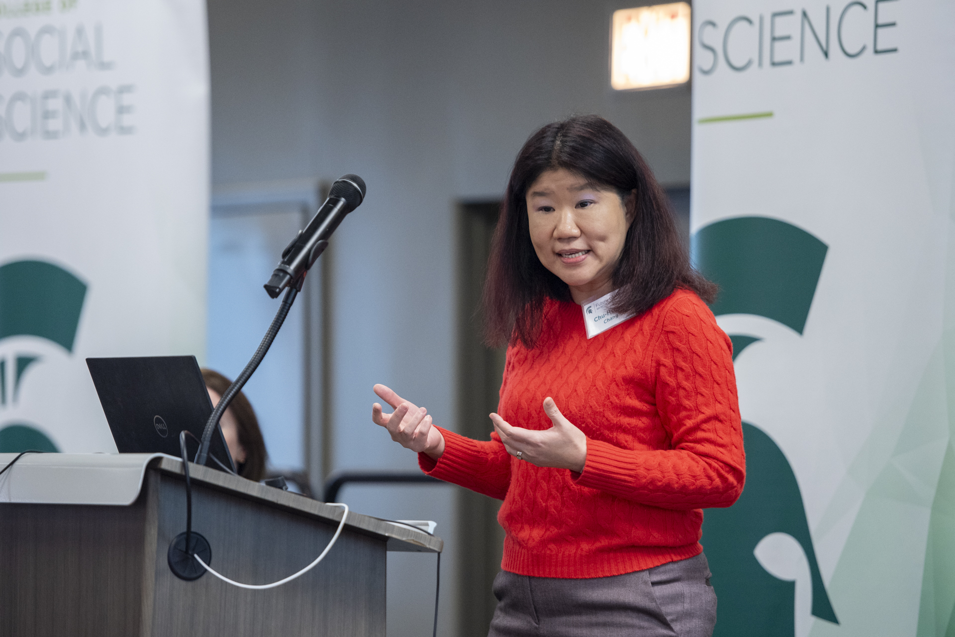 Daisy Chang presenting about her research at the Future of Work event.