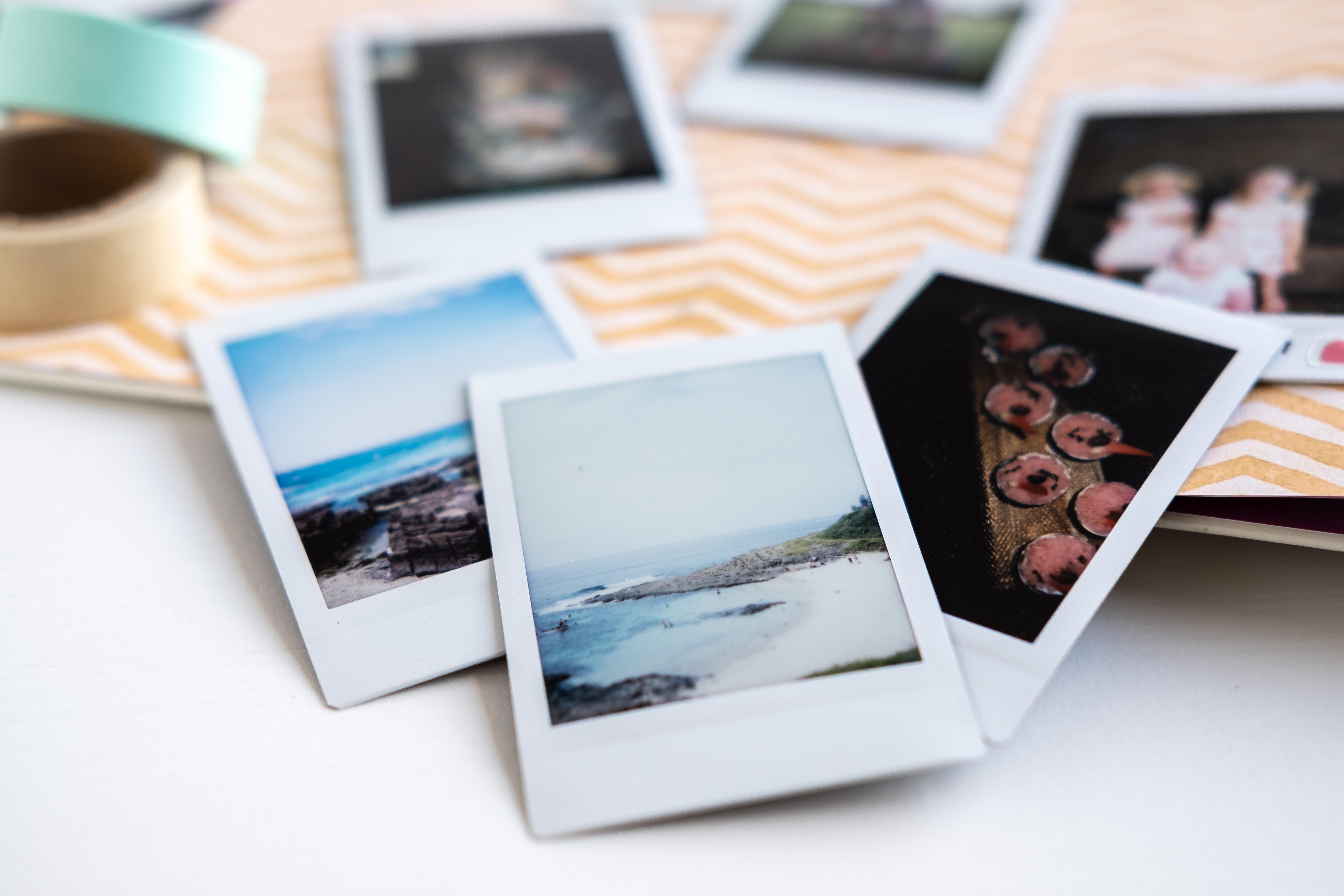a scattering of polaroid pictures